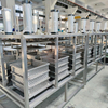 Pressa automatica per formaggio a cilindro